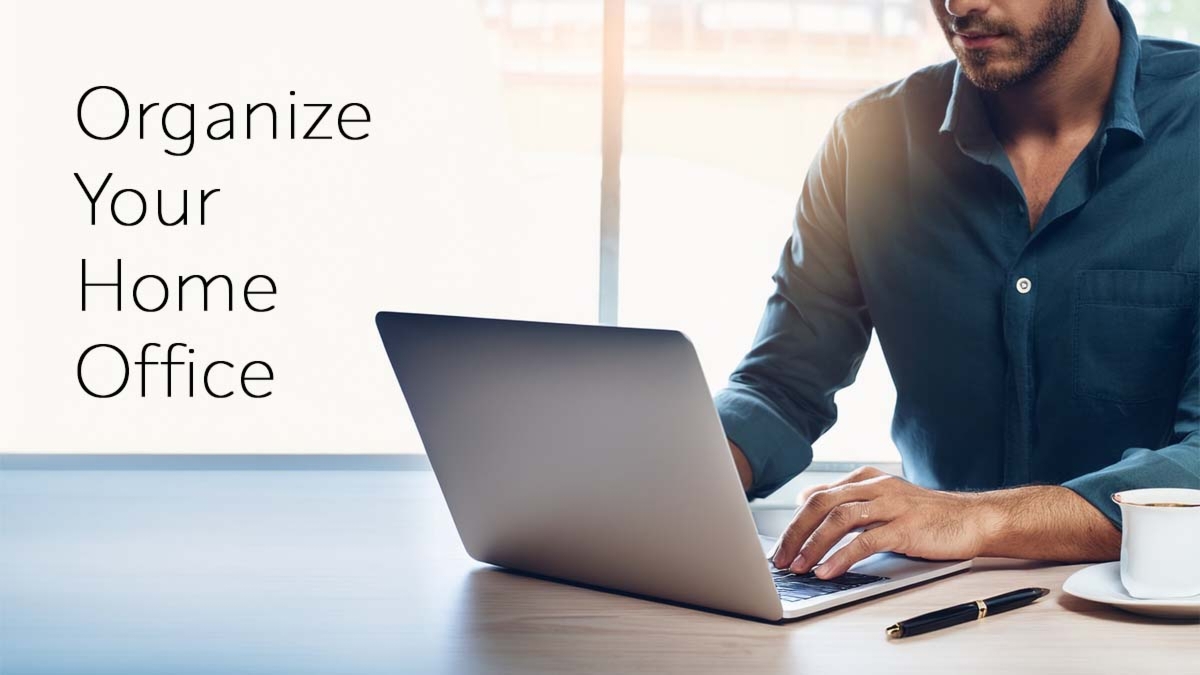 Man With Laptop Working At Home