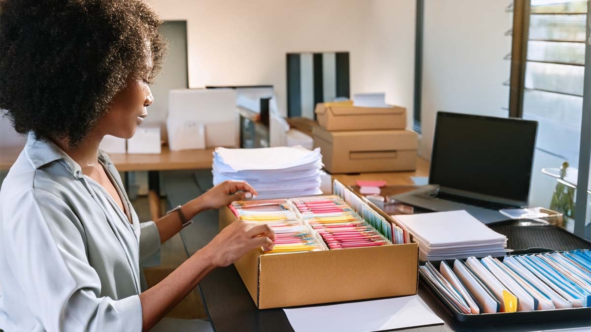 Woman Sorting Work Files