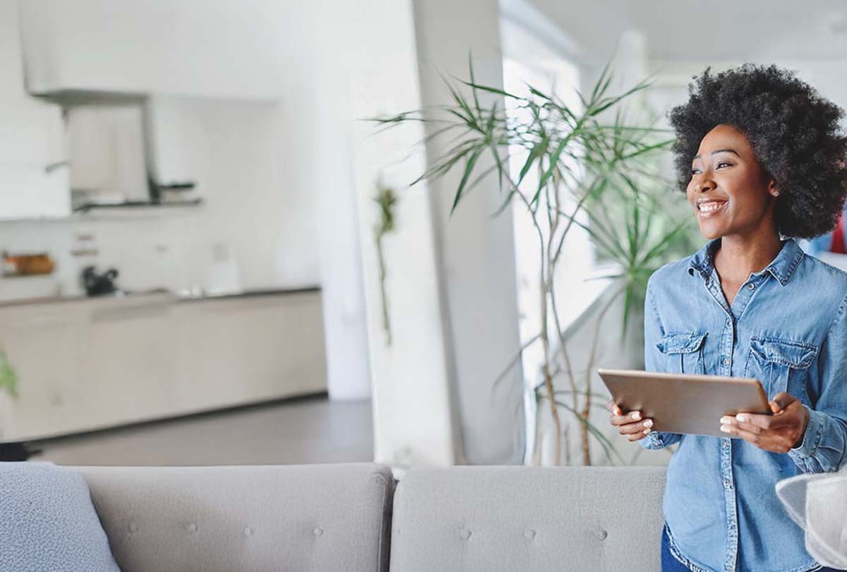 Woman Making A System To Include Cleaning Schedule
